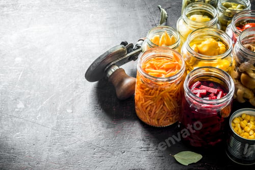 Preview: Assortment of jars of preserved vegetables.