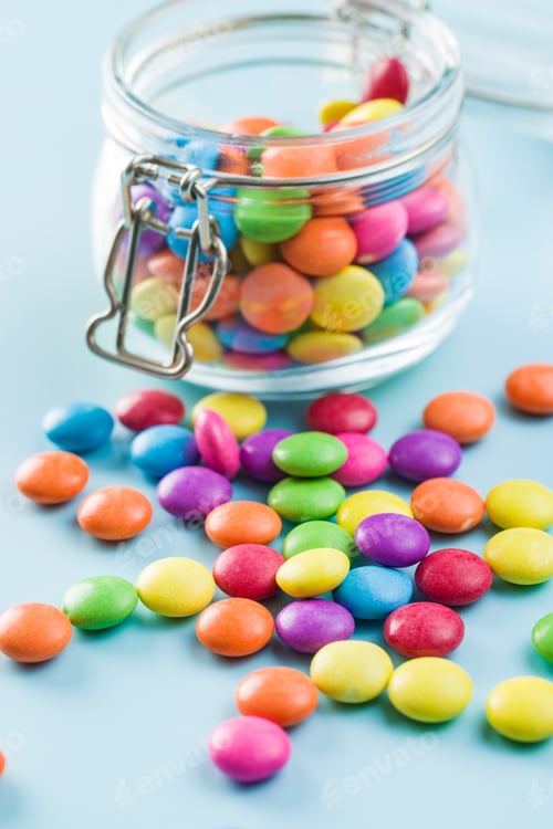 Preview: Colorful chocolate candy pills.