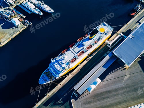 Preview: Aerial view of large cruise ship near the port in Italy