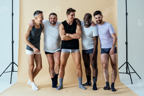 Preview: Group of multiethnic men posing for a male edition body positive beauty set