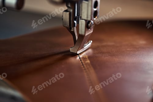 Preview: Working process of leather craftsman. Tanner or skinner sews leather on a special sewing machine
