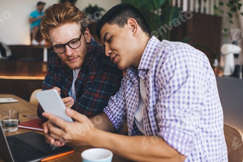 Preview: Multiracial business men working in office space