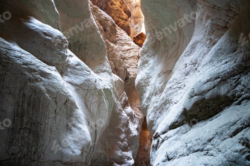 Preview: canyon entrance with light shining on rocks