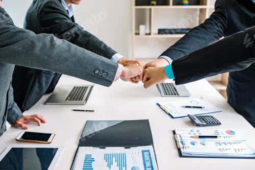 Preview: Business people at meeting showed the power and unity of working together teamwork.