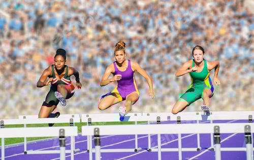 Preview: Runners jumping over hurdle on track
