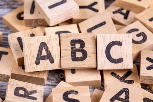Preview: Wooden alphabet on the wooden table