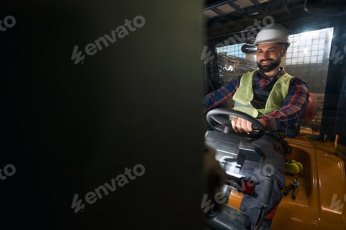 Preview: Portrait of loader sitting in the car