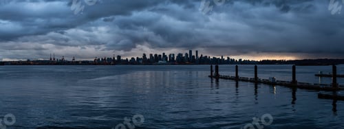 Preview: Panoramic view of Downtown City Skyline during a striking and dramatic sunset