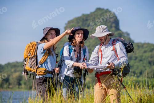 Preview: Family appears to be preparing for a hiking or camping expedition, as they are all equipped with bac