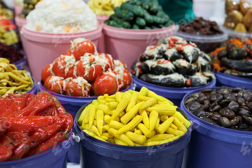 Preview: A large selection of various canned vegetables at the farmer's market.