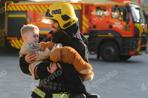 Preview: Firefighter holding child boy to save him in fire and smoke,Firemen rescue the boys from fire