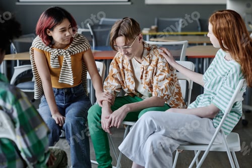 Preview: Teenagers Supporting Boy At Therapy Session