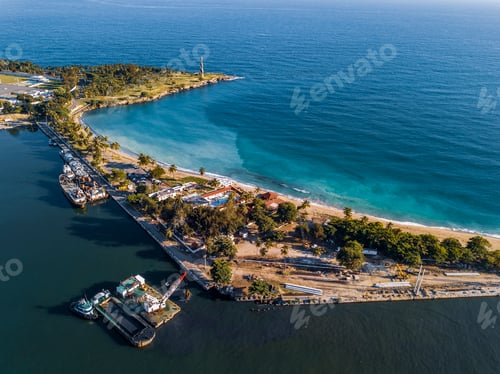 Preview: Landscape of the Bayahibe Beach surrounded by the sea and greenery in the Dominican Republic
