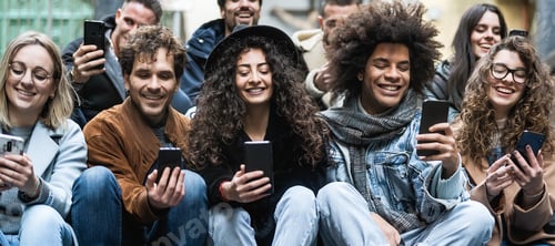 Preview: Young multiracial group of friends using mobile smartphone sitting on urban stairs