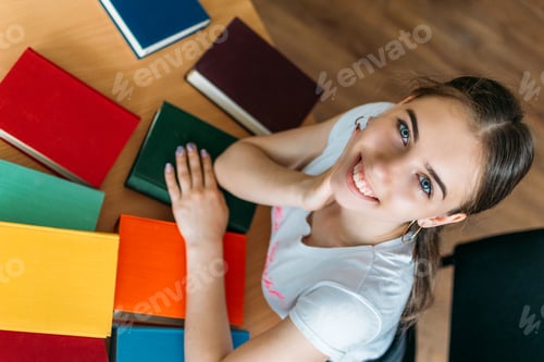 Preview: Back to school, reading book, education, library concept. Student girl with book on background of