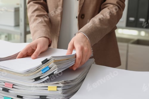 Preview: Woman working with documents in office, closeup
