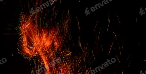 Preview: Campfire flame isolated on black background