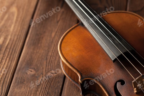 Preview: Violin on a wooden textured table