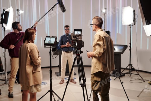 Preview: Film Shoot in Progress with Crew and Actor