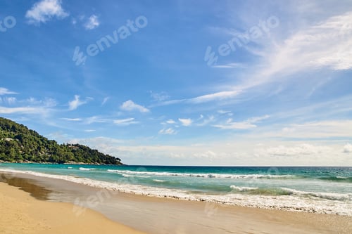 Preview: Serene tropical beach with golden sand, turquoise waves, and clear blue sky