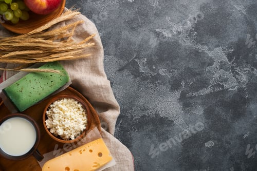 Preview: Happy Shavuot. Background for Shavuot traditional religious Jewish celebration. Milk and cheese, rip
