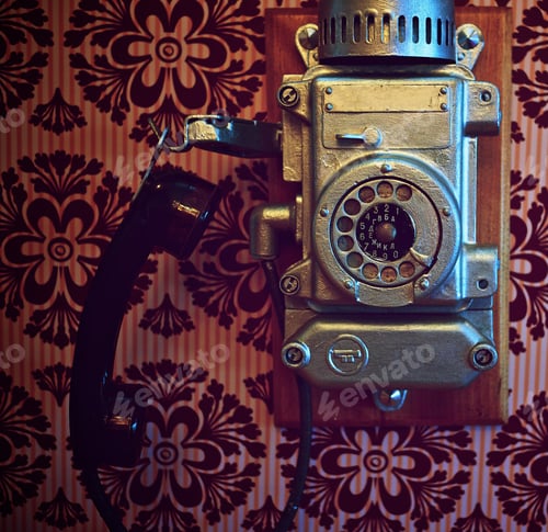 Preview: Vintage phone on a wall.