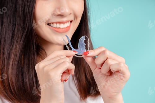 Preview: Dental of asian woman with tooth sample and white teeth increase confidence