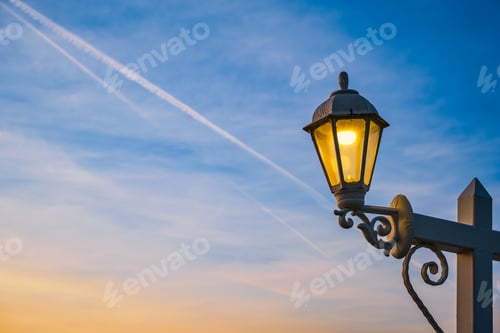 Preview: Electric lamp in retro style on a wooden pole.