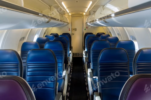 Preview: Interior cabin of a passenger plane with leather chair for passenger