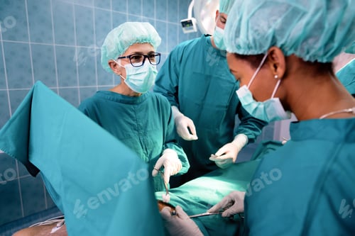Preview: Surgeons Working Together on Procedure in Hospital