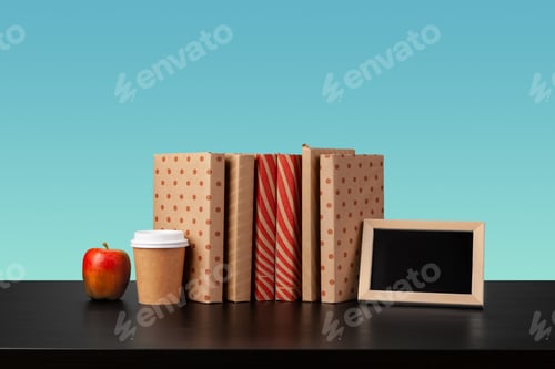 Preview: Stack of books on black wooden table