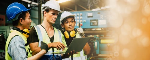 Preview: Engineer team working and checking by laptop with engine in industry