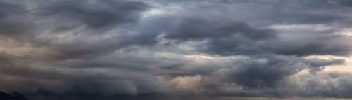 Preview: Dramatic Panoramic View of a cloudscape during a dark, rainy and colorful sunset