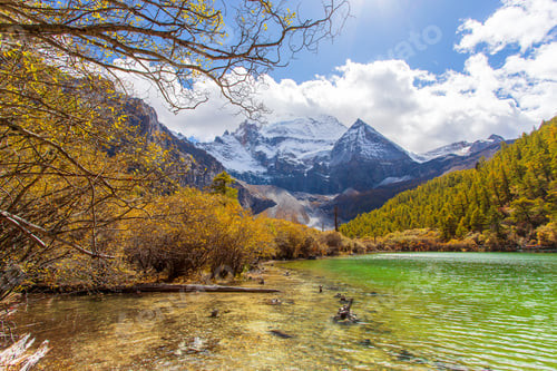 Preview: Pearl Lake or Zhuoma La Lake and snow mountain in autumn in Yading Nature reserve, Sichuan, China.