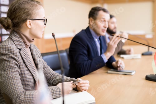 Preview: Group of Business People in Conference
