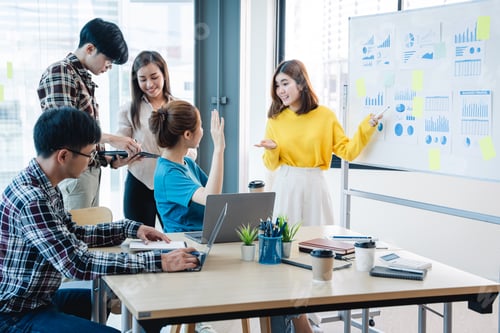 Preview: Successful business people present analytics reports while working with colleagues in the modern off