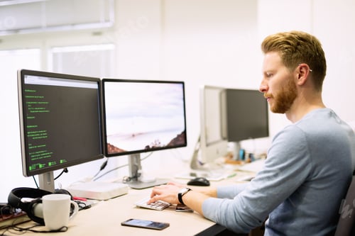 Preview: Programmer working in a software developing company