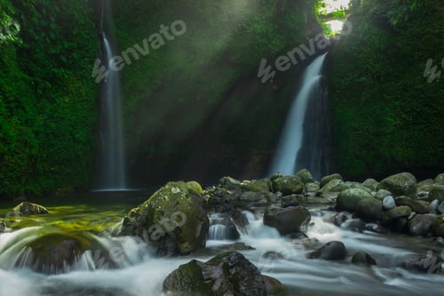 Preview: panoramic view of Indonesia with morning sun and waterfall in tropical forest