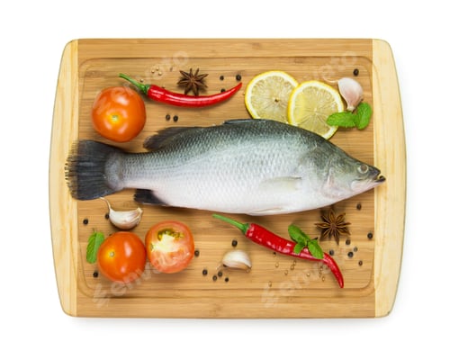 Preview: Fresh Sea Bass with Vegetables on Wooden Board