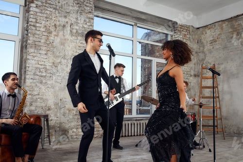 Preview: Young international musicians, a band performing on the loft stage. The concept of music, hobby