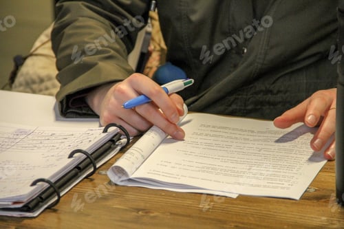 Preview: Doing homework on school assignment, girls hands, working hard, studying hard, preparing for exam