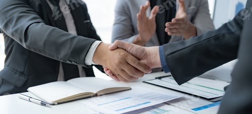 Preview: Business success. Business people handshake agreement confirmed in the investment business.