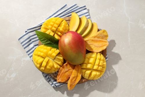 Preview: Ripe delicious mango on a white table