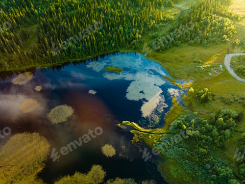 Preview: Bamselitjernet lake near Beitostolen surrounded by forests during sunset, Norway