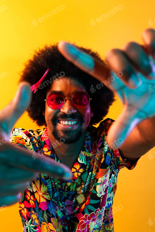 Preview: African man portrait in studio on colorful background