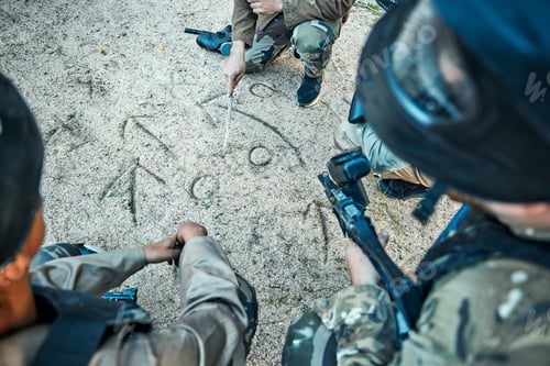 Preview: Paintball, battlefield and team building with game plan, mission and strategy drawing in sand with