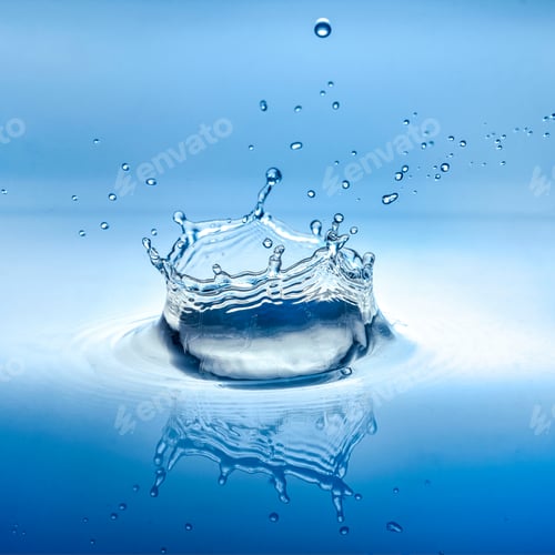 Preview: water splash with reflection and drops on a blue background