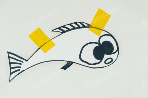 Preview: close up view of hand drawn fish with sticky tapes isolated on grey, april fools day holiday concept