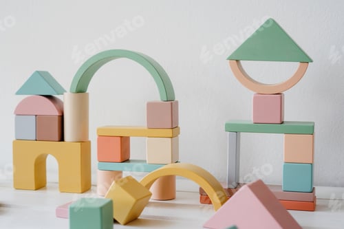 Preview: Children's constructor made of natural material. Abstract construction of wooden cubes.