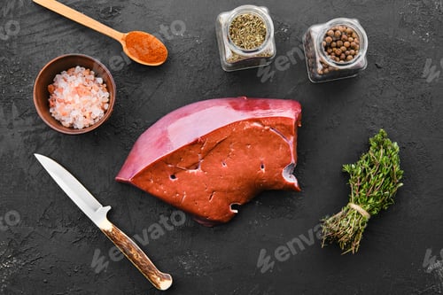 Preview: Raw fresh beef liver with spice and herbs